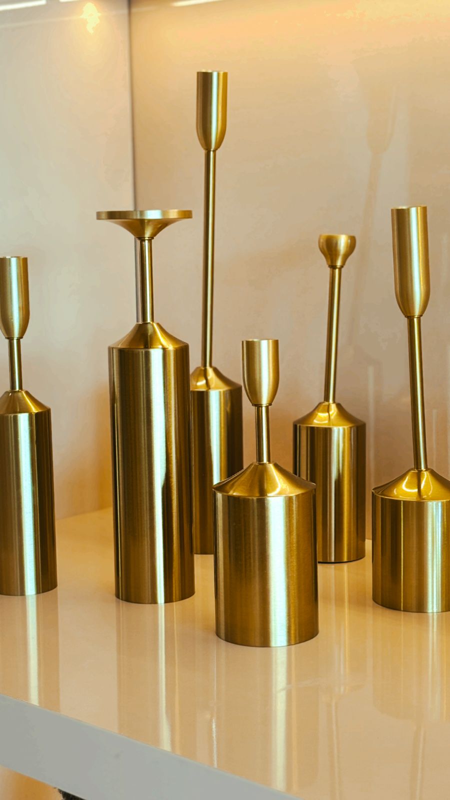 CASTIÇAIS ESCULTÓRICOS DOURADOS