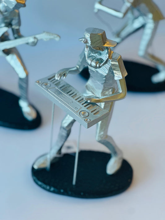 ESCULTURA MÚSICO TECLADISTA