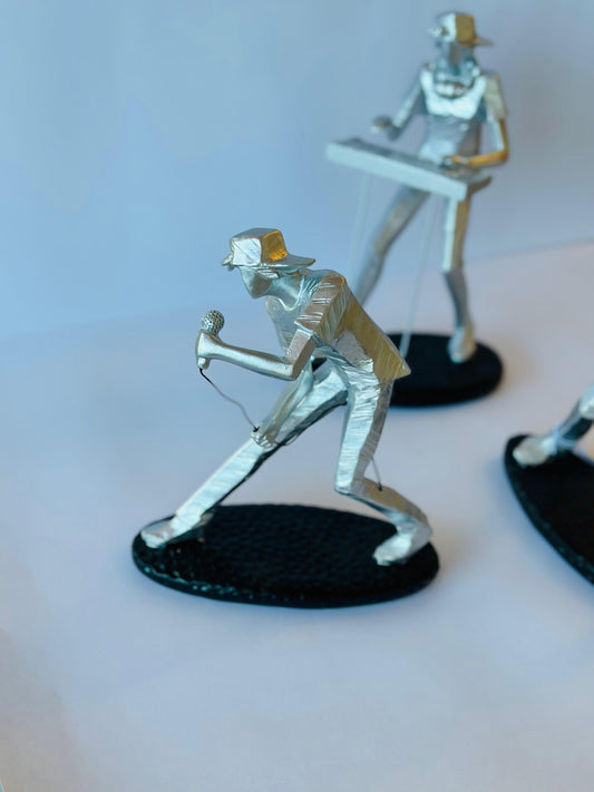 ESCULTURA MÚSICO CANTOR