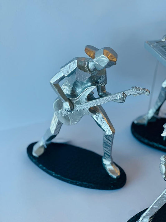 ESCULTURA MUSICO GUITARRISTA