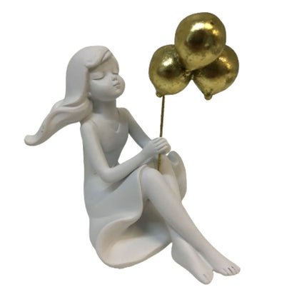 ESCULTURA MENINA BALÃO DOURADO